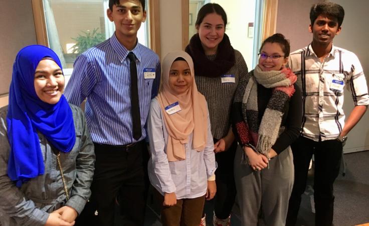 From left: Nisreen Jehka, Zain Mufti, Aziera Azlen, , Amra Kojic, Yulvie Nuri, and Mohan Raj Arul are exchange students in Juneau and Sitka. Azlen was the last to arrive, in early 2019. She says she was encouraged to study abroad by her mother in Malaysia, who attended college in Connecticut. (Photo by Zoe Grueskin/KTOO)