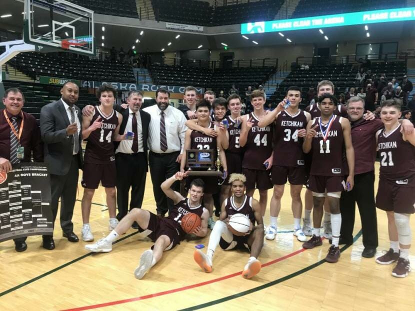 L-R Rear: Asst. Coach Rick Shaner, Asst Coach Darryl Simons, Gavin Salazar (14), Head Coach Eric Stockhausen, sportscaster Russell Thomas, Cody Kemble, E.R. Caparas (holding trophy), team manager AJ Malouf (partially obscured), Arthur Williams, Jake Taylor, Tyler Slick (44), Robert Hilton-Seludo (34), Wyatt Barajas, Chris Lee (11), sportscaster Clark Slanaker, Kristian Pihl (21). L-R Seated: Kyle Smith (12), Marcus Lee