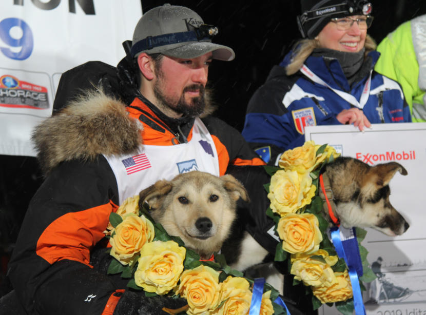 Iditarod 2019 champion Pete Kaiser and his dogs Marrow and Lucy at the end of the 1,000-mile race in Nome.