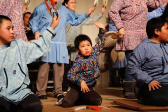 The smallest Kasigluk dancer performs with his community dance group at the Cama-i Dance Festival on March 16, 2018 in Bethel, Alaska. (Photo by Amara Freeman/KYUK)