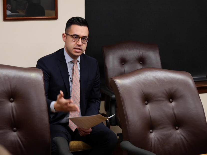 Gov. Mike Dunleavy’s Press Secretary Matt Shuckerow answers reporters' questions after a briefing in the governor’s cabinet room in the Capitol in Juneau on March 21, 2019.