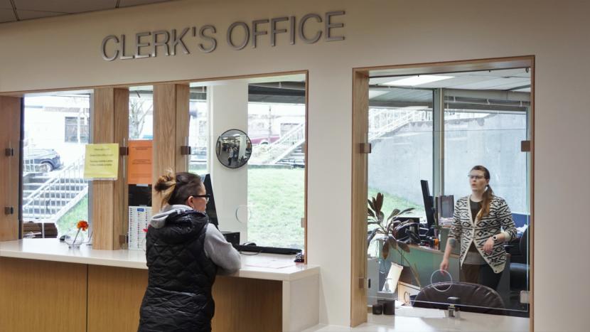 Amanda Beebe-Bay covers the front desk at the clerk's office in the Dimond Courthouse in Juneau on April 22, 2019.