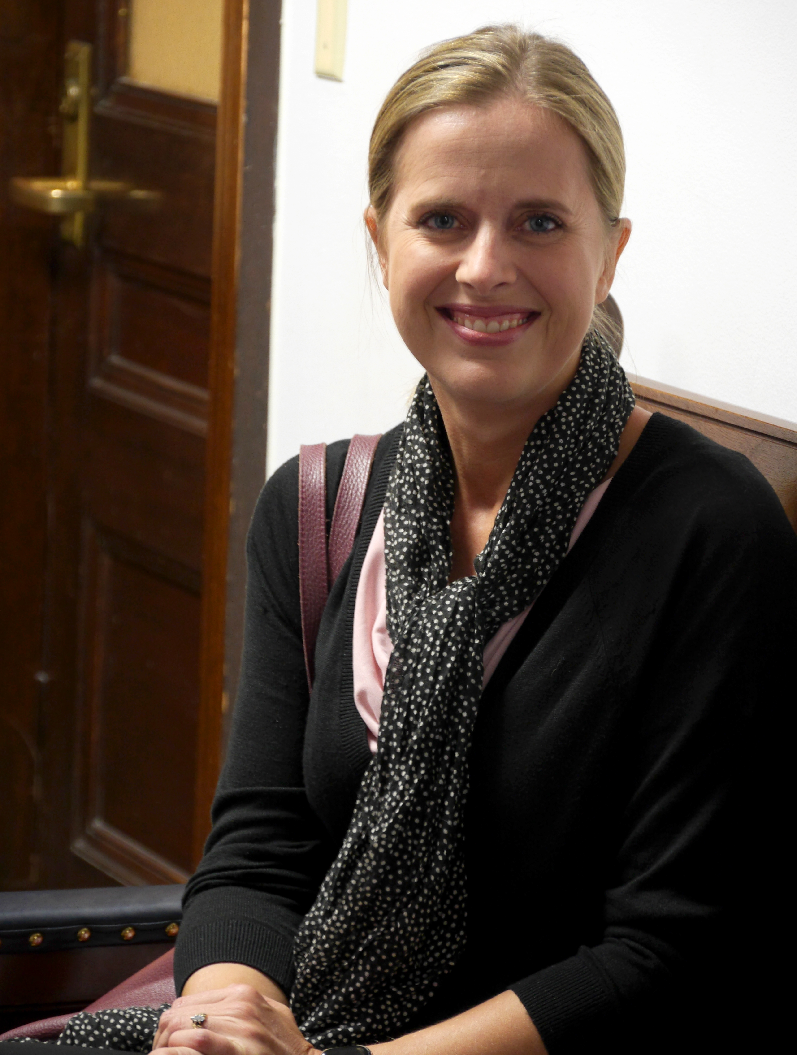 Alaska State Hospital and Nursing Home Association President and CEO Becky Hultberg waits for a meeting to begin at the Capitol in Juneau on April 3, 2019.