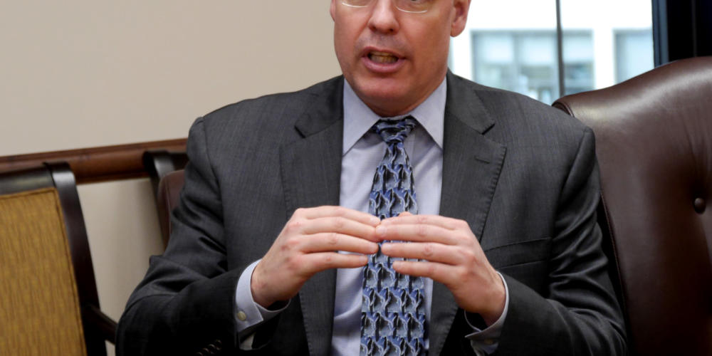 Revenue Commissioner Bruce Tangeman answers questions from the press about the governor’s 10-year budget plan on March 21, 2019. He spoke at a press briefing held in the governor’s cabinet room at the State Capitol in Juneau.