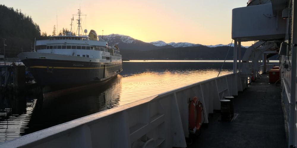 The MV Malaspina sits at the dock in Auke Bay, near Juneau, as the MV LeConte pulls away from the dock early March 28, 2019. Both ships are part of the Alaska Marine Highway System.