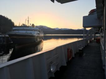 The MV Malaspina sits at the dock in Auke Bay, near Juneau, as the MV LeConte pulls away from the dock early March 28, 2019. Both ships are part of the Alaska Marine Highway System.