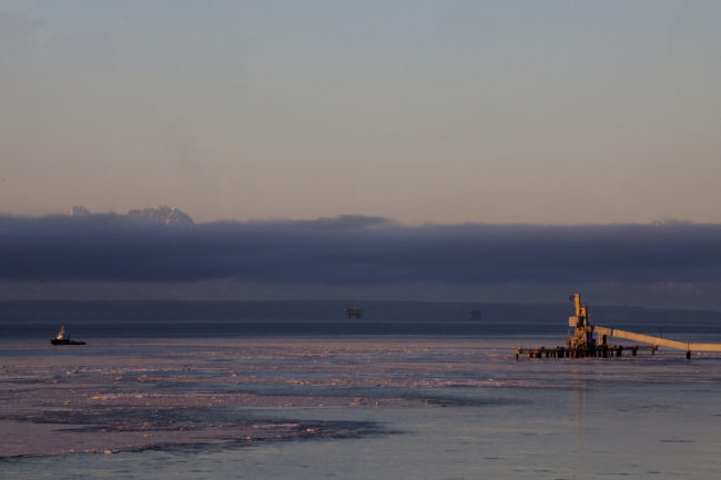 Cook Inlet oil platforms are visible from shore near Kenai, Alaska. (Photo by Rashah McChesney/Alaska’s Energy Desk)