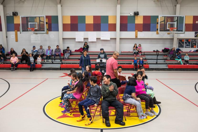 Children play musical chairs during a celebration of life event at the Kiana school. The event was organized in response to two recent suicides in the region. Officials were worried that deaths might ignite one of the “clusters” of suicides that sometimes plague this part of the state.