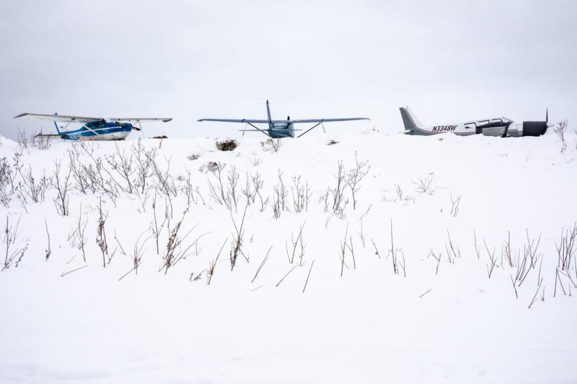 Airplanes at the Kiana airport in March. Only about 14% of Alaska villages and cities can be reached by road, leaving many Alaskans reliant on boats or single-engine planes, which are often grounded when the weather is bad.