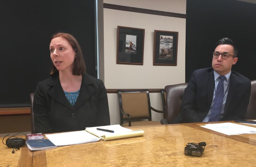 Assistant Attorney General Cori Mills responds to a reporter's question during a press availability regarding a dispute over school funding, May 9, 2019. Matt Shuckerow, Gov. Mike Dunleavy's press secretary, is on the right. (Photo by Andrew Kitchenman/KTOO and Alaska Public Media)