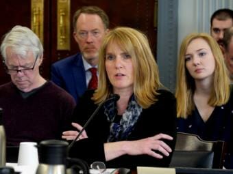 Sen. Nathasha von Imhof, R-Anchorage, co-chair of the Senate Finance Committee, sits at the witness end of the table, to explain SB104, a bill she introduced that would limit the amount of money the state can spend yearly, April, 10, 2019.