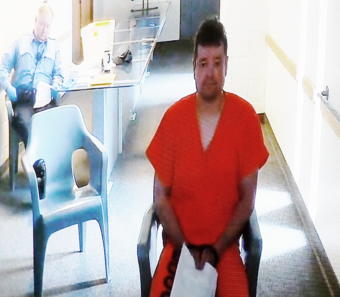 Brent Bartlett appears by videoconference from Lemon Creek Correctional Center for his first court hearing July 29, 2019 following his arrest for allegedly driving under the influence and assault.
