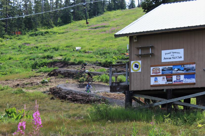 Mountain bikers ride the newly renovated trail at Eaglecrest Ski Area on July 21, 2019. (Photo by Adelyn Baxter/KTOO)