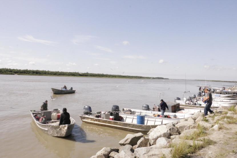 Fishermen dock before running into the Kwik'Pak store for supplies before the Yukon's final commercial summer opening on July 15, 2019. (Photo by Anna Rose MacArthur/KYUK)