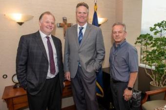 Outgoing chief of staff Tuckerman Babcock, Gov. Mike Dunleavy and incoming chief of staff Ben Stevens pose for a photo that accompanied the announcement of that Stevens is succeeding Babcock. (Photo courtesy of the governor's office)