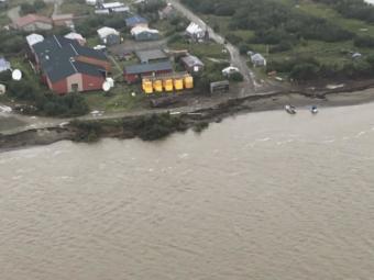The Napakiak School fuel storage facility sits 76 feet from the riverbank’s erosion point, along the Kuskokwin River in Alaska, Aug. 16, 2019.