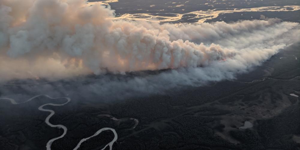 The McKinley Fire, as seen in an aerial photo, burns Sunday near the Parks Highway north of Anchorage.