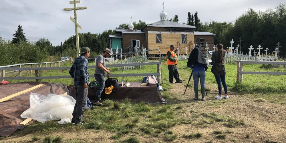 A Donlin Gold film crew interviews sub-deacon Eric Morgan Sr. about the Chuathbaluk church renovation paid for by Donlin.