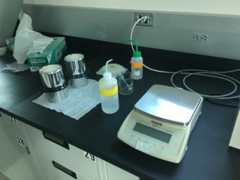 Equipment for the bomb calorimeter at NOAA's Ted Stevens Marine Research Institute, photographed on Aug. 1, 2019. (Photo by Zoe Grueskin/KTOO)