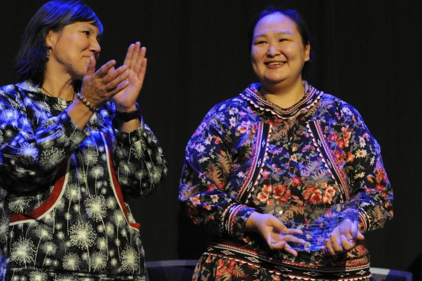 Former Mountain Village police officer Anna Bill holds a Shirley Demientieff Award presented to her during the Alaska Federation of Natives Convention in the Dena'ina Center on Thursday, Oct. 18, 2018. Lt. Gov. Valerie Davidson is at left.