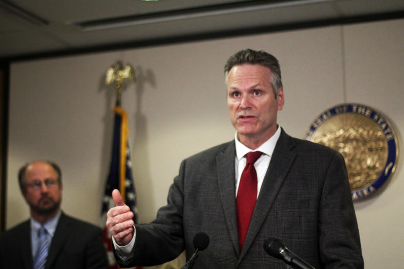 Alaska Gov. Mike Dunleavy speaks at a news conference at his Anchorage office on Friday, Sept. 27, 2019.