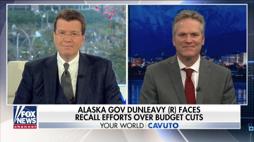 Gov. Mike Dunleavy, left, appears on Fox News with host Neil Cavuto. Dunleavy has reached conservatives through several national media appearances. (Screen capture from Fox News: https://video.foxnews.com/v/6096004523001/#sp=show-clips)