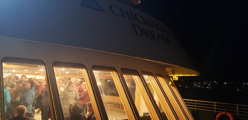 Alaska Travel Industry Association convention-goers schmooze aboard Alaskan Dream Cruises' Chichagof Dream in downtown Juneau on Oct. 9, 2019. The ship was one of several venues for the convention's community night.