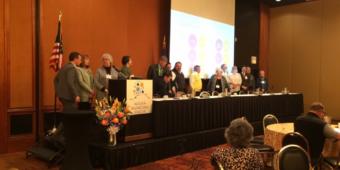 Mayors from 15 Alaska communities sign an agreement establishing a statewide commission to oversee the collection and remittance of online sales tax. (Photo courtesy of Michelle Hale)