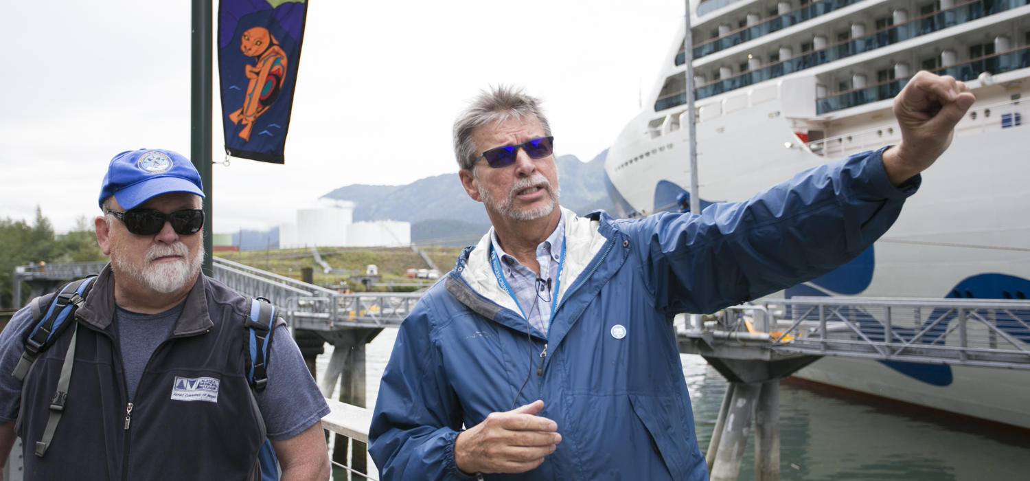 Kirby Day, port operations manager for the Holland America Group, points out changes to the waterfront at the Franklin Dock in downtown Juneau on July 17, 2019. Also pictured: Former Juneau Mayor Bruce Botelho.