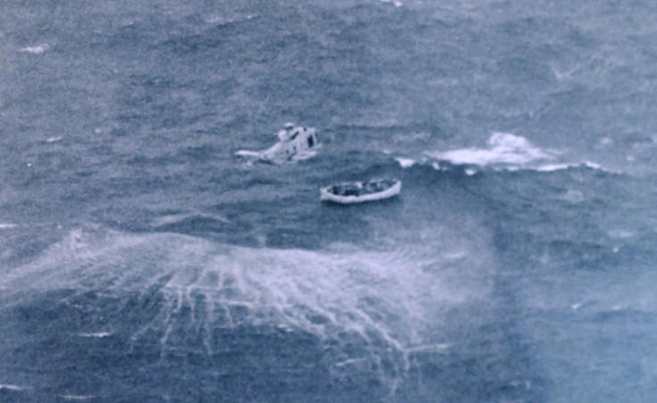 A helicopter prepares to rescue survivors from a life raft during the Prisendam rescue in October 1980. (Photo courtesy of U.S. Coast Guard
