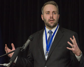 Joshua Kindred, then an attorney for the Alaska Oil and Gas Association, at a conference in 2018. (Photo courtesy Heather Holt)