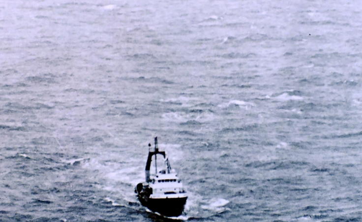 Another ship takes the cruise ship Prisendam under tow after a fire crippled the vessel in October 1980. Headed to a potential port in the Pacific Northwest for repairs, it later sank. (Photo courtesy of U.S. Coast Guard)