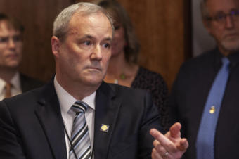 Spokesperson Jeff Turner gestures to reporters during a press conference on Gov. Mike Dunleavy's newest budget proposal on Wednesday, December 11, 2019, at the Capitol in Juneau, Alaska. (Photo by Rashah McChesney/KTOO)