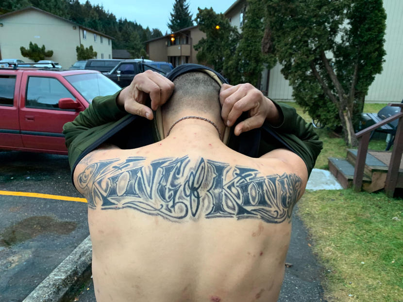 Residents and visitors at the Chinook apartment complex in the Mendenhall Valley show tattoos they were given by Kelly "Rabbit" Stephens on Sunday, Dec. 29, 2019 in Juneau, Alaska. Many said they didn't want their identities known for fear of reprisal. Stephens was killed during an early-morning altercation with Juneau Police. (Photo by Rashah McChesney/KTOO)