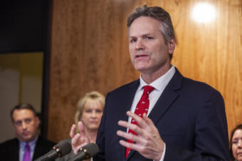 Gov. Mike Dunleavy unveils his budget on Wednesday, December11, 2019, at the Capitol in Juneau, Alaska. (Photo by Rashah McChesney/KTOO)