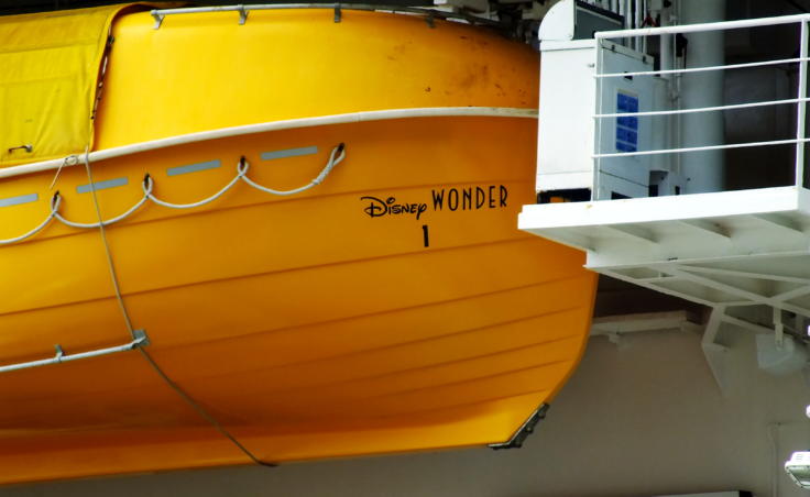 Disney had to get approval from international maritime authorities to paint their lifeboats aboard the cruise ship Disney Wonder to look like Donald Duck’s feet. (Photo by Matt Miller/KTOO)