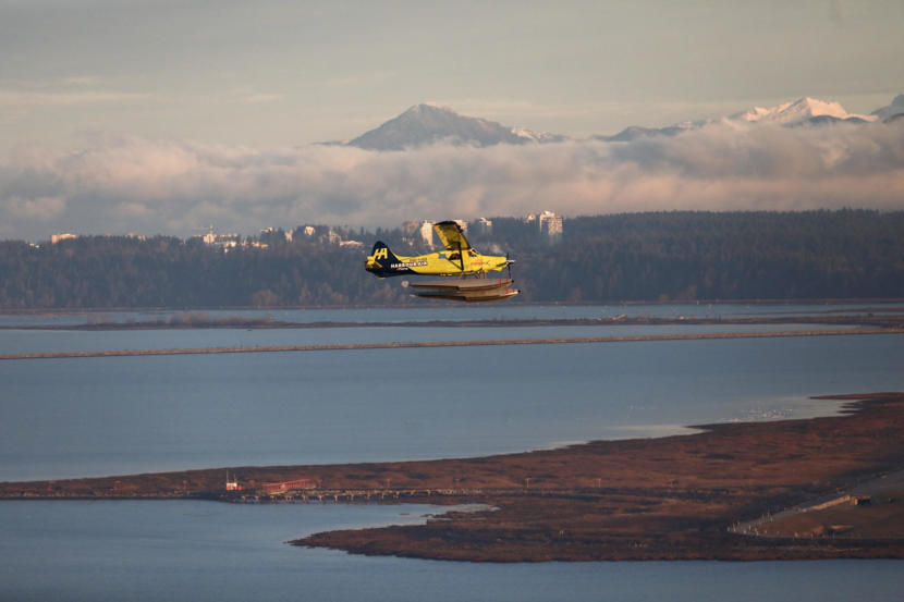 Harbour Air's e-Plane flies over the Fraser River near Vancouver, British Columbia, on Dec. 10, 2019.