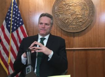 Gov. Mike Dunleavy, R-Alaska, speaks to reporters in the Capitol in Juneau, Jan. 31, 2020. (Photo by Andrew Kitchenman/KTOO and Alaska Public Media)