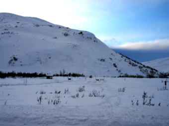 Picture taken Jan. 1, 2020 of the avalanche that killed two men and partially buried another person on Dec. 30, 2019. This hill is approximately 500 feet high and is located near the entrance to the Chuck Creek Trail, also known as the Samuel Glacier parking lot, in the Chilkat Pass or Haines Pass area. The avalanche appeared to start just below the crown in the center of the picture and appeared to extend as much as 300 feet wide.