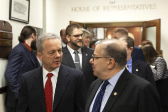 Gov. Mike Dunleavy’s Chief of Staff Ben Stevens talks to Senate Majority Leader Lyman Hoffman, D-Bethel, after Dunleavy's State of the State address on Monday, January 27, 2020 in Juneau, Alaska. (Photo by Rashah McChesney/KTOO)