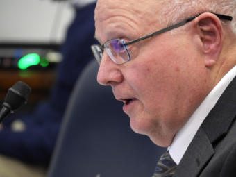 Tom Boutin, executive director of the Alaska Industrial Development and Export Authority, fields questions during a House Commerce, Community and Economic Development Finance Subcommittee meeting in the state Capitol in Juneau on Feb. 4, 2020. Legislators were asking him about a no-bid contract he awarded to a relative of a prominent financial donor to Gov. Mike Dunleavy. (Photo by Skip Gray/KTOO)