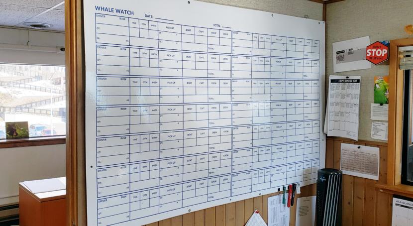 A daily scheduling white board in the dispatch office of Juneau Tours and Whale Watch is blank for the pre-season on March 13, 2020.