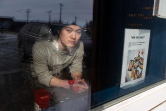 Alex Kim, owner of Chopstix Sushi Restaurant, says he may have to return to Korea if business doesn't pick-up. Bethel restaurants are in peril following mandates that restrict business to delivery and pick-up orders amidst the COVID-19 outbreak. March 31, 2020 in Bethel, Alaska. (Photo courtesy Katie Basile/KYUK)