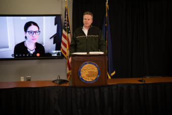 Alaska Gov. Mike Dunleavy speaks about the state's COVID-19 response from the Atwood Building in Anchorage on March 31, 2020. Also pictured: Department of Health and Social Services Chief Medical Officer Dr. Anne Zink. (Creative Commons photo courtesy Alaska Governor's Office)