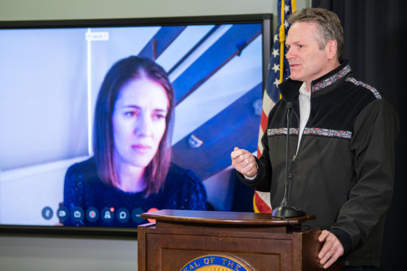 Dr. Anne Zink, Alaska's Chief Medical Officer, watches Gov. Mike Dunleavy during a press conference on the COVID-19 pandemic on April 2, 2020, in Anchorage, Alaska. (Creative Commons photo courtesy Alaska Governor's Office)