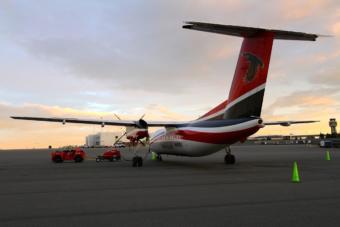 A RavnAir plane sits on the tarmac at Ted Stevens Anchorage International Airport. (Courtesy RavnAir)
