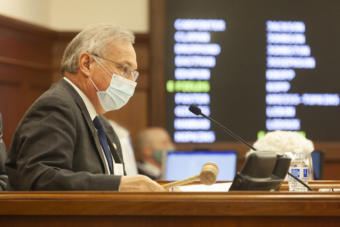 Speaker of the House Bryce Edgemon gavels out of a floor session on Monday, May 18, 2020, in Juneau, Alaska. Lawmakers gaveled in for the last few days of their regular session to pass a COVID-19 aid bill. (Photo by Rashah McChesney/KTOO)