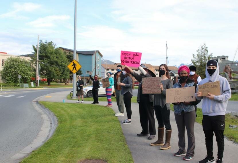 Demonstrators stand in Sitka’s main roundabout in solidarity with the Black Lives Matter movement earlier this month. “It’s important that this isn’t seen as a trend, and it isn’t seen as a one time thing,” demonstrator Devan Parsly said. “So, we intend on doing it for as long as we need to.” (Erin McKinstry/KCAW)