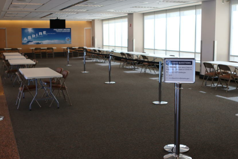 One of the new screening areas at the Ted Stevens Anchorage International Airport. Employees will take travelers’ new declaration forms and any proof of a negative test result. They will also provide testing here. (Tegan Hanlon/Alaska Public Media)