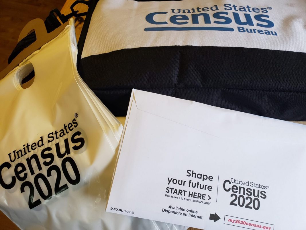 2020 Census materials including envelope and plastic bags for leaving census forms